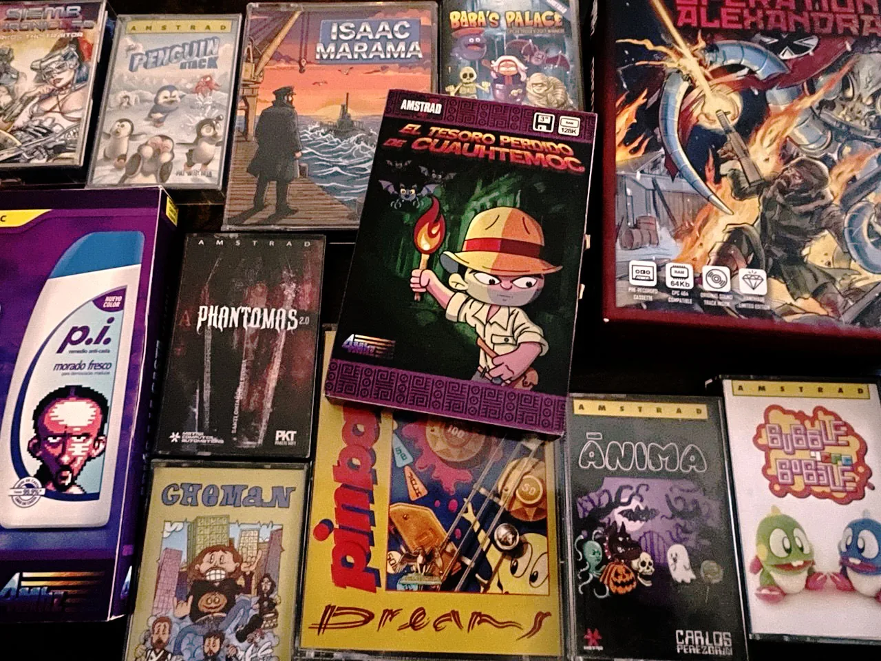 A collection of Amstrad CPC homebrew tapes and boxes, with El Tesoro Perdido de Cuauhtémoc, Pinball Dreams, Anima and Bubble Bobble among them
